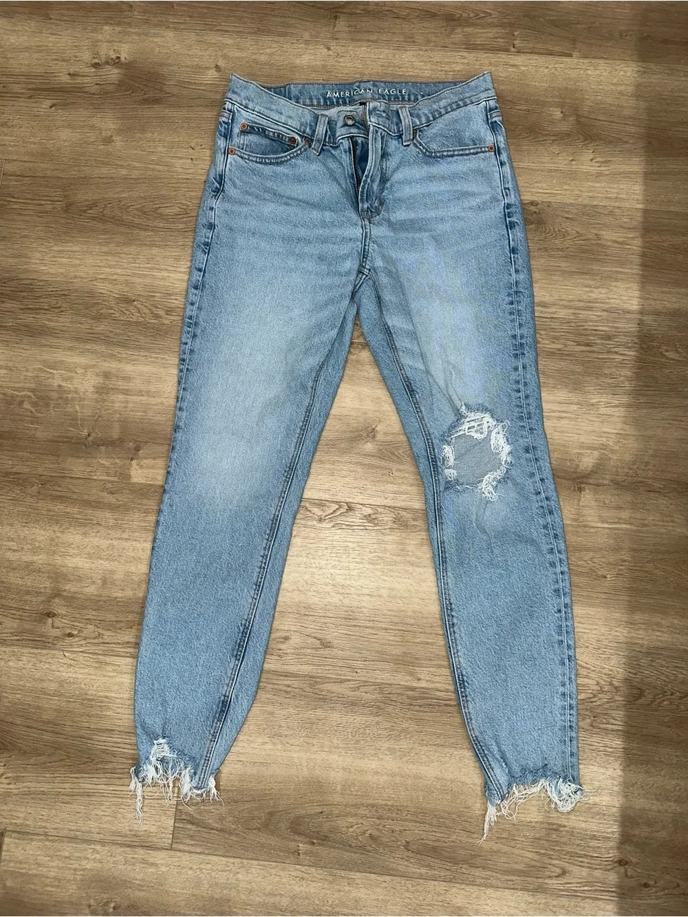 American Eagle Outfitters Light Blue Boyfriend Jeans with Distressed Hem